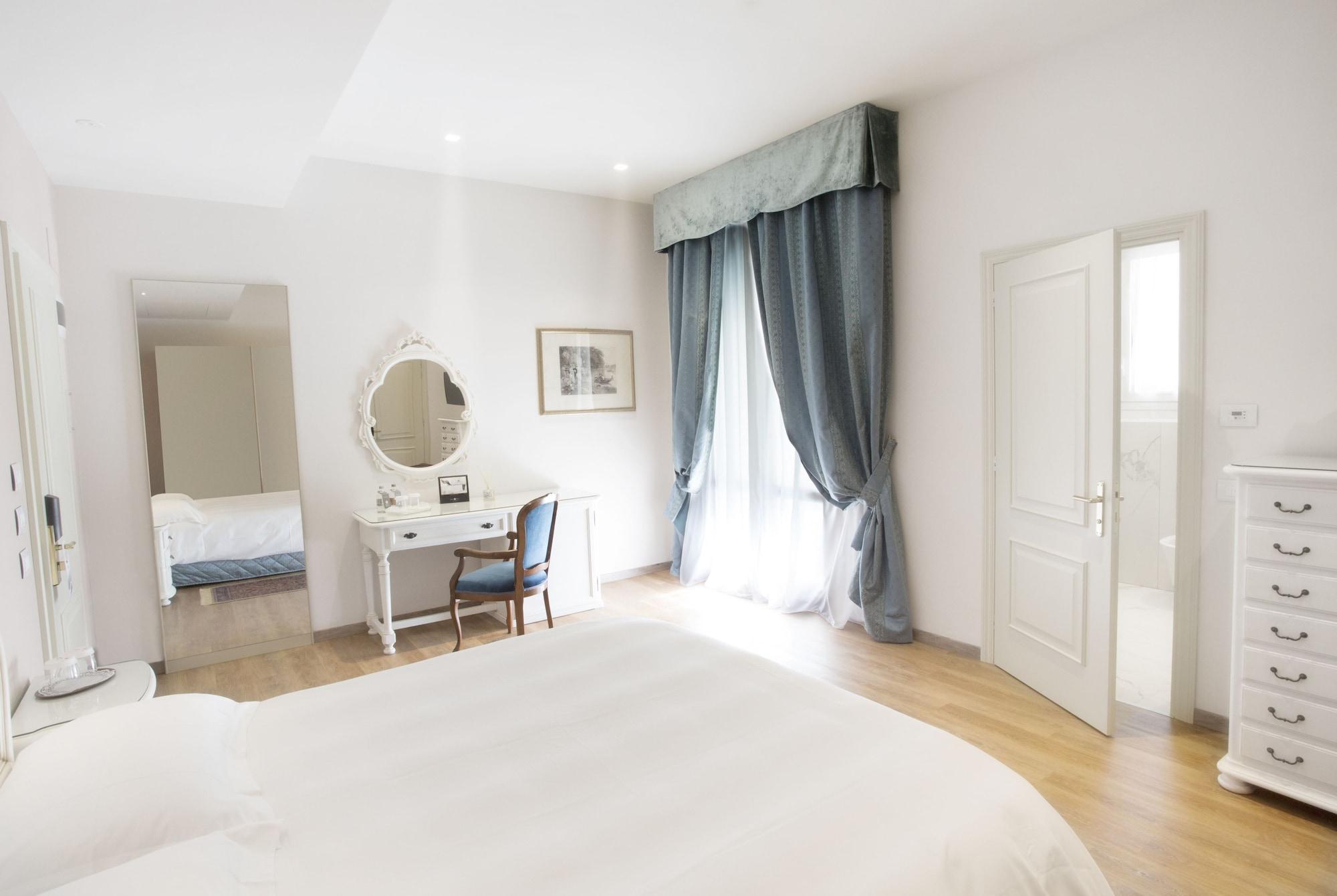 Grand Hotel Trieste & Victoria Abano Terme Luaran gambar A bedroom